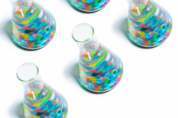 Conical flasks with colorful contents