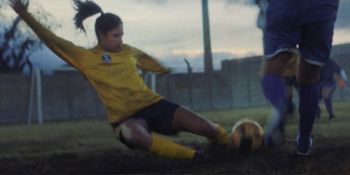 Woman playing football