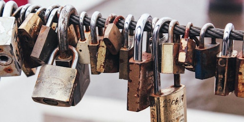 A rope with a row of padlocks attached to it