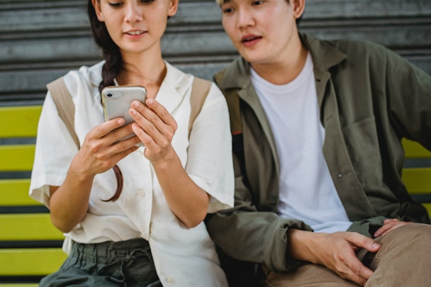 Group of people look at data privacy on their mobile phones in APAC